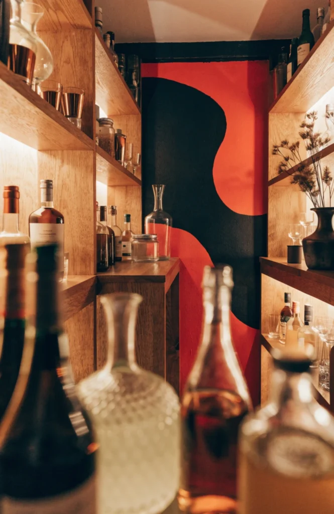 Convert an unused hall closet into a hidden bar