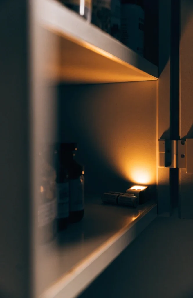 Install a battery-powered light in dark cabinets