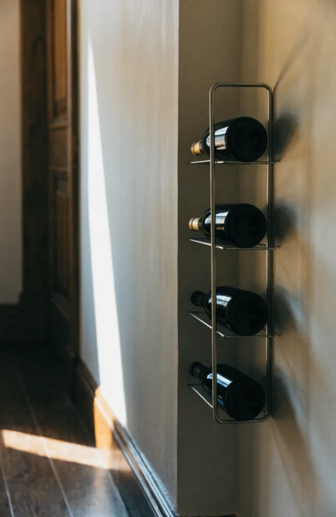 A slim wall-mounted wine rack for narrow spaces
