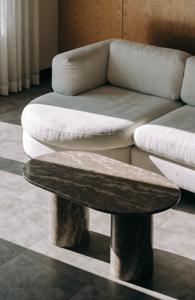 Choose an oval or round coffee table for a chaise-end sofa