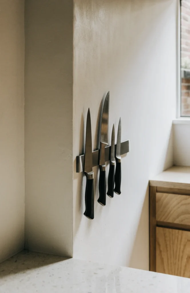 Mount a magnetic strip for knives and metal tools