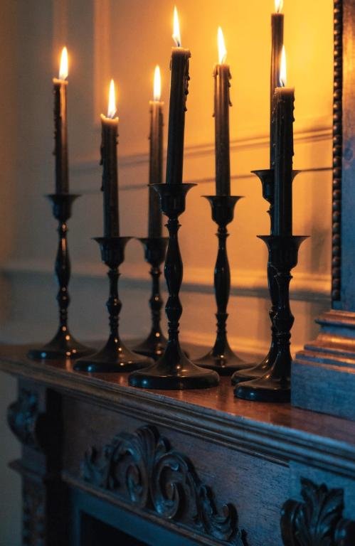 close-up-of-black-taper-candlesticks