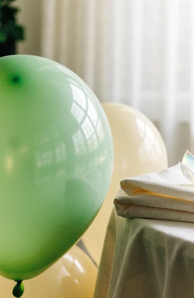 sage-green-and-cream-balloons-and-tabl