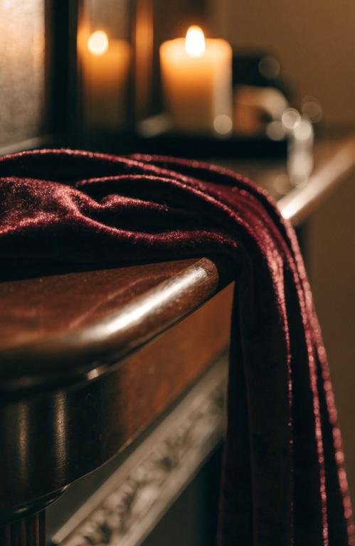 close-up-of-a-deep-burgundy-velvet-scarf-draped