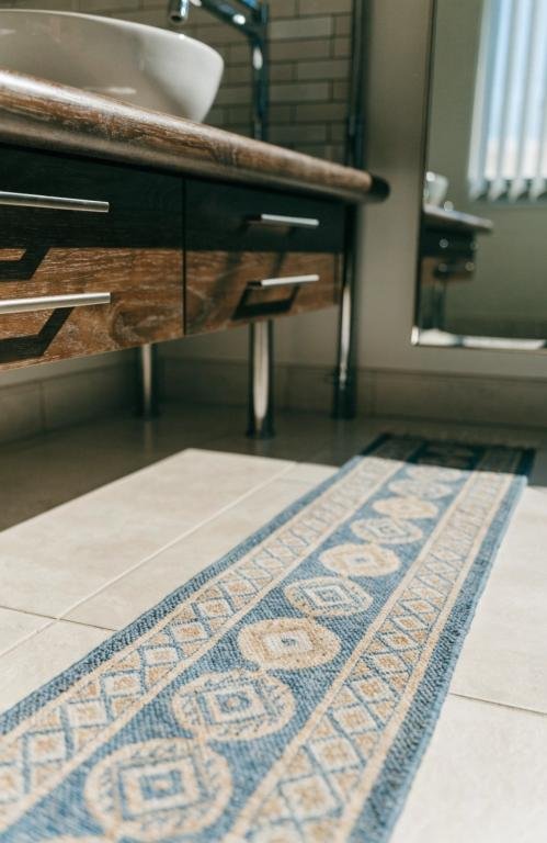 close-up-of-a-narrow-patterned-runner-rug