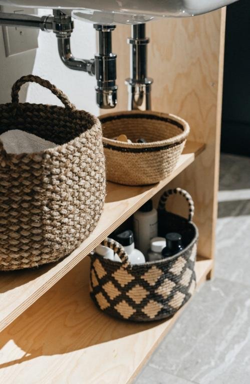 close-up-of-woven-storage-baskets-organized