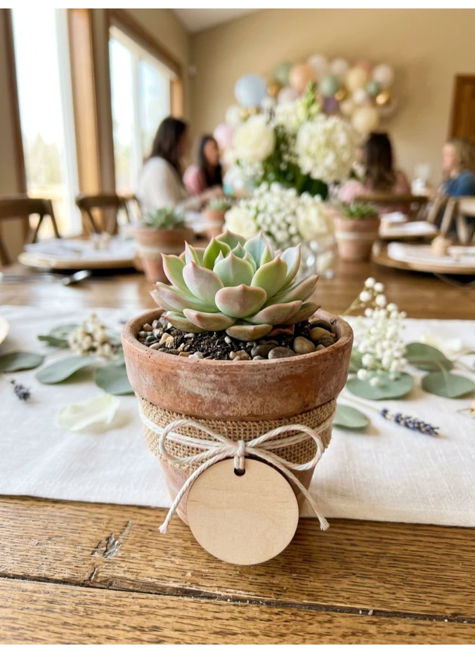 A single potted plant per table