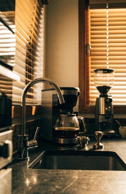 close-up-of-a-compact-coffee-bar-set-up-in-an-unde