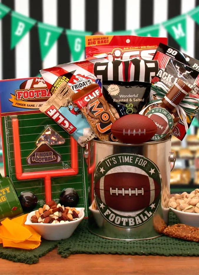 Football tailgate gift pail with snacks, mini football and game day treats
