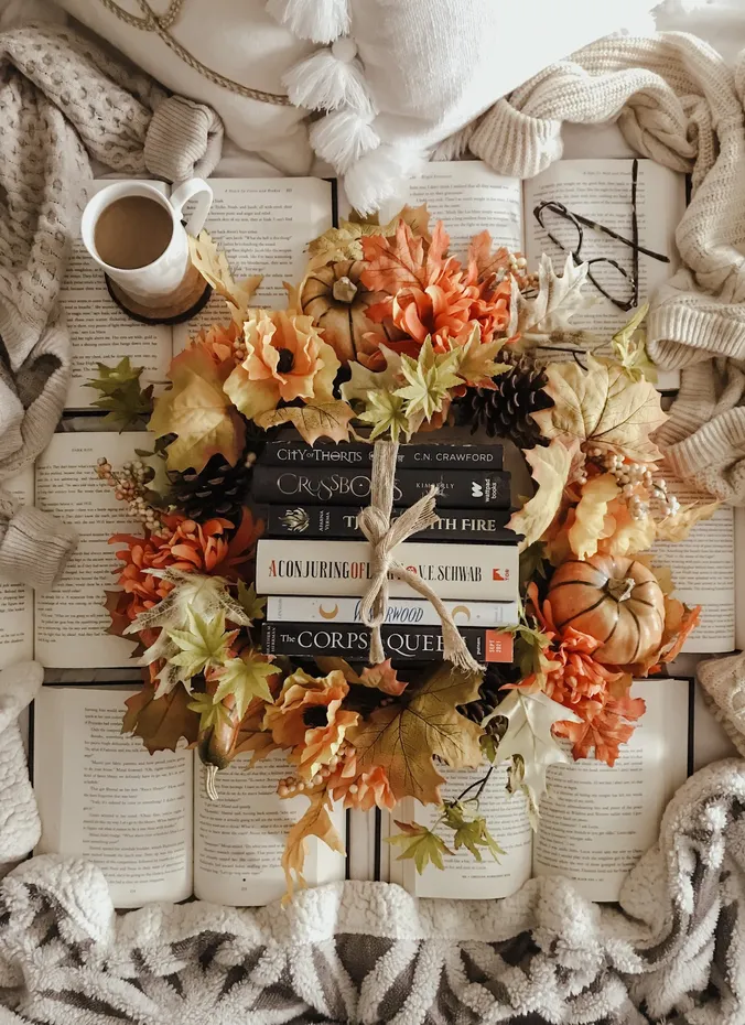 Cozy mystery novel beside a warm drink