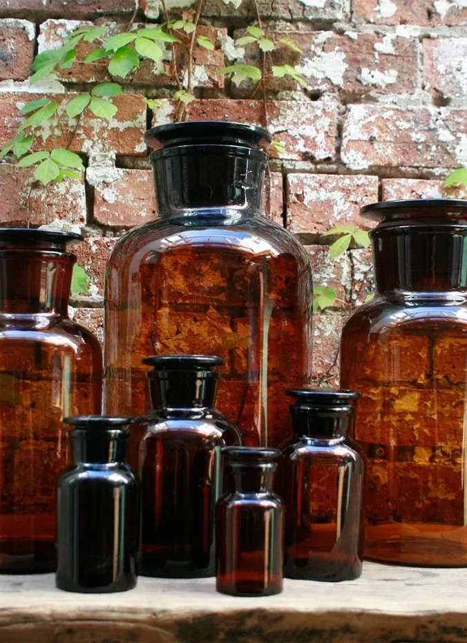 Vintage glass bottles used as vases