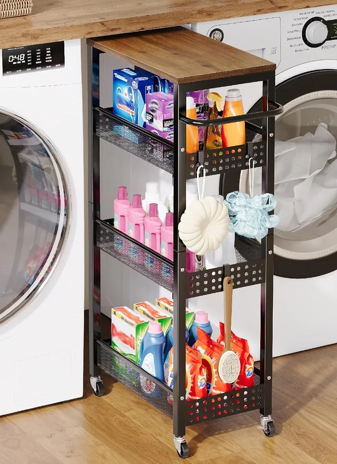 Slim rolling storage cart beside a stacked washer and dryer